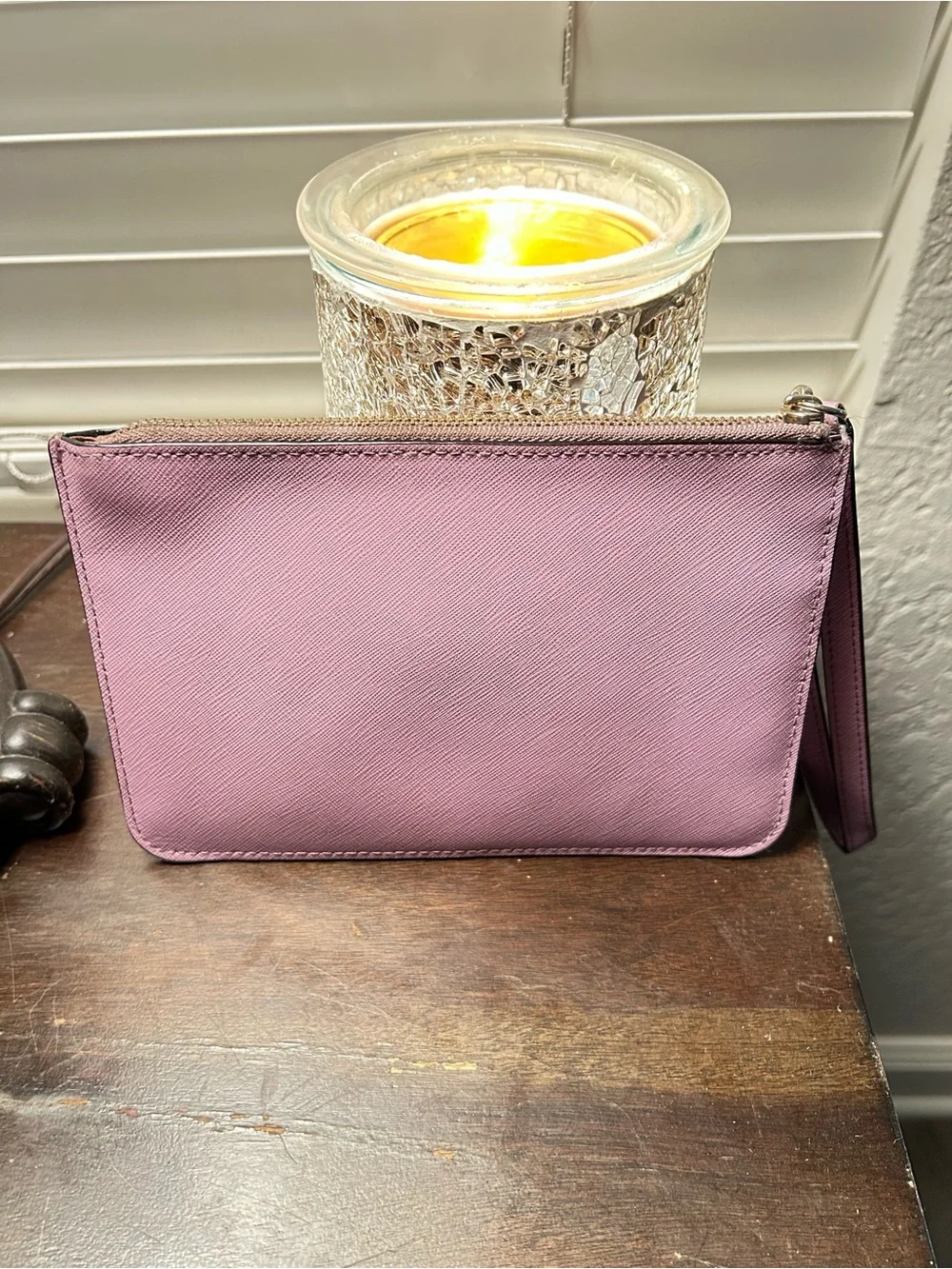 kate spade mauve wristlet with front zip pocket